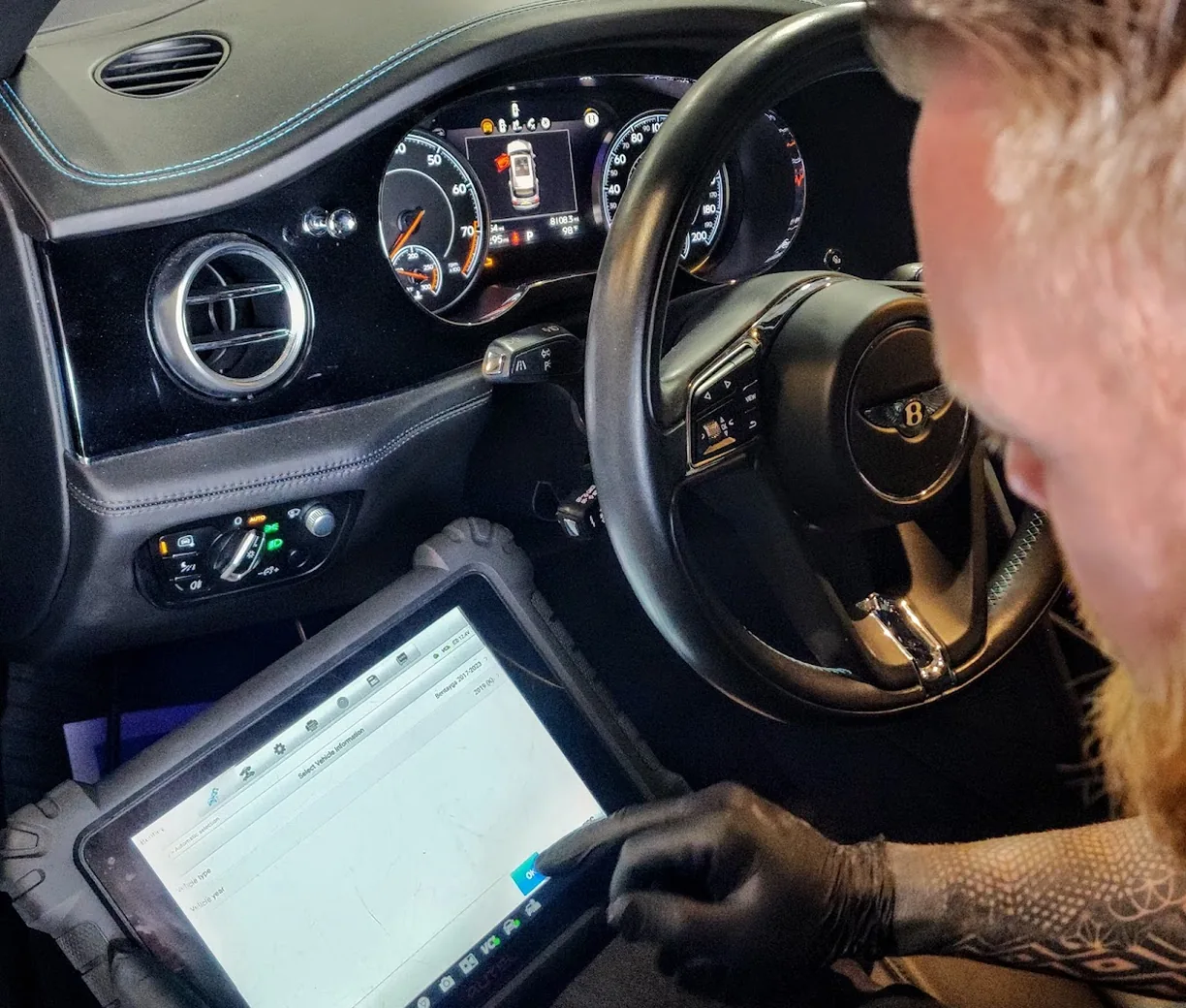 Tampa pre-purchase car inspector diagnosing a Bentley